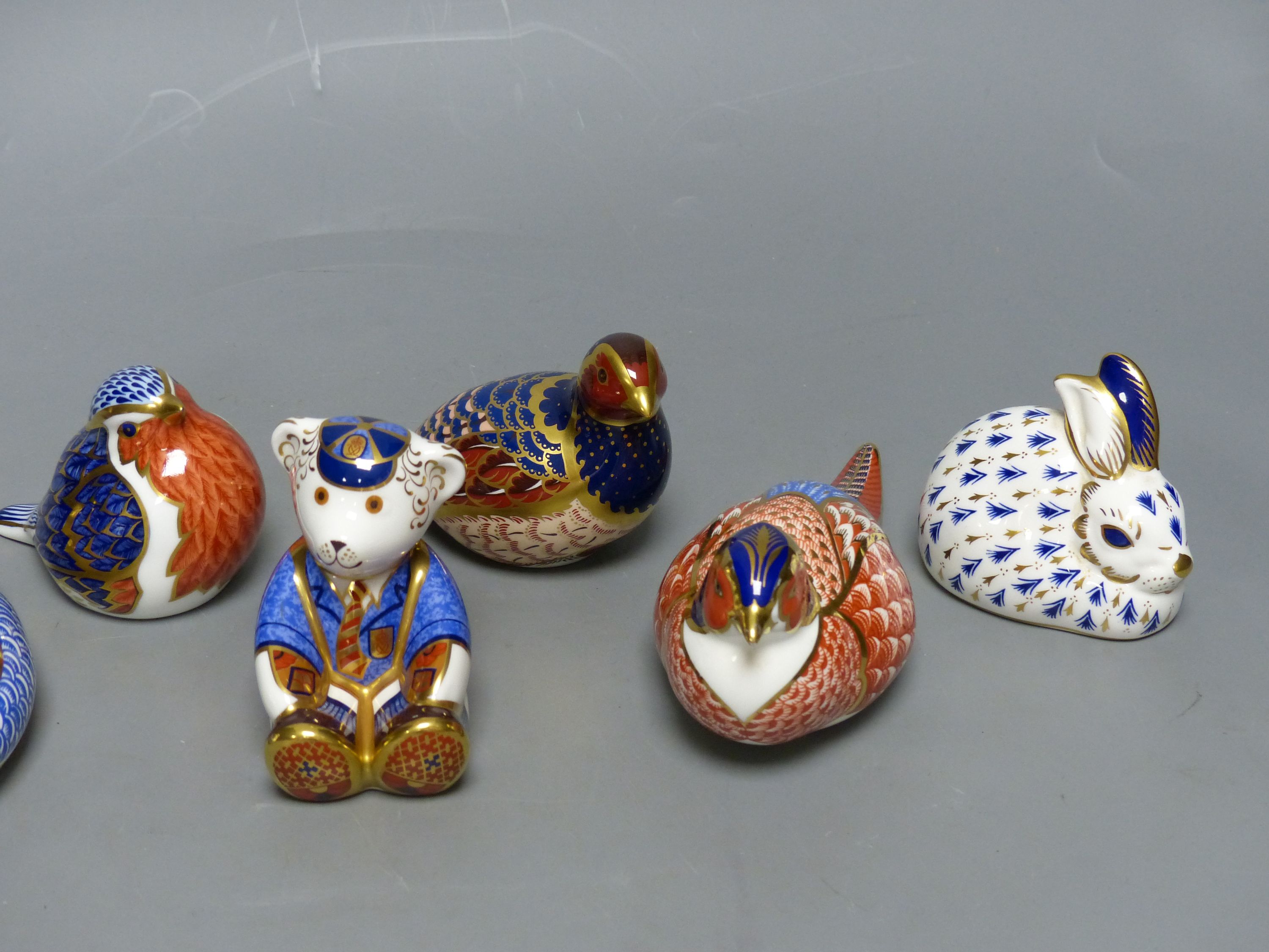 Eight Royal Crown Derby animal or bird paperweights